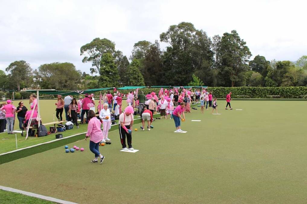 DRESS UPS: A group of pink bowlers enjoy a game for Pink Up Your Town. Photo: Supplied