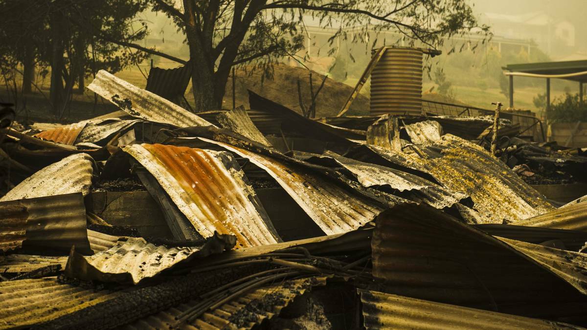  The aftermath of the Dunns Road fire that impacted Batlow on Saturday. Picture: Dion Georgopoulos 