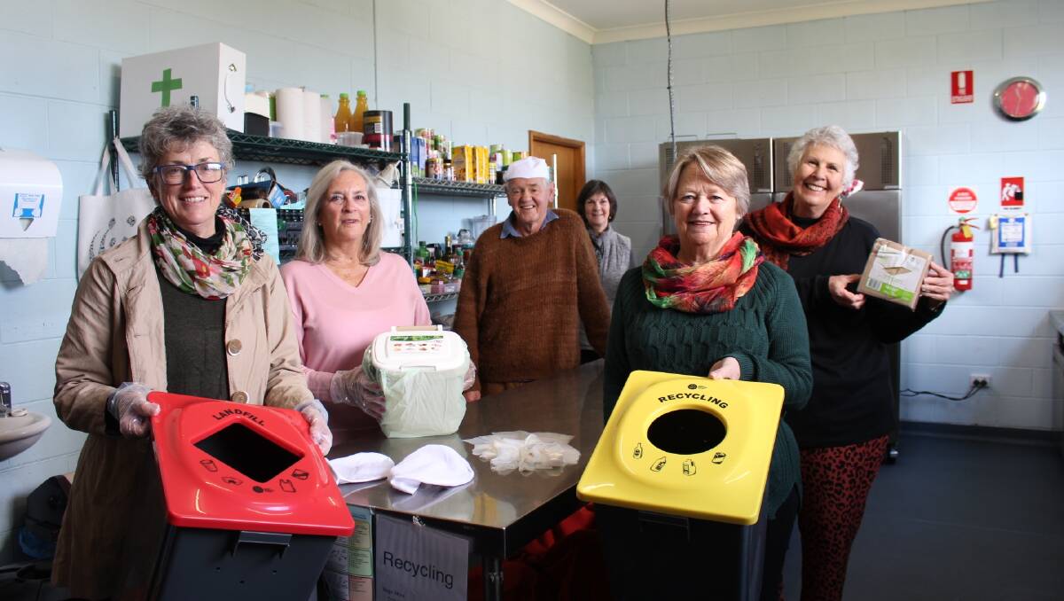 Second time around: Pearls Place volunteers with the recycling bins, plus gloves and recyclable serviettes which they planned on using in July when they were first hoping to re-open. 
