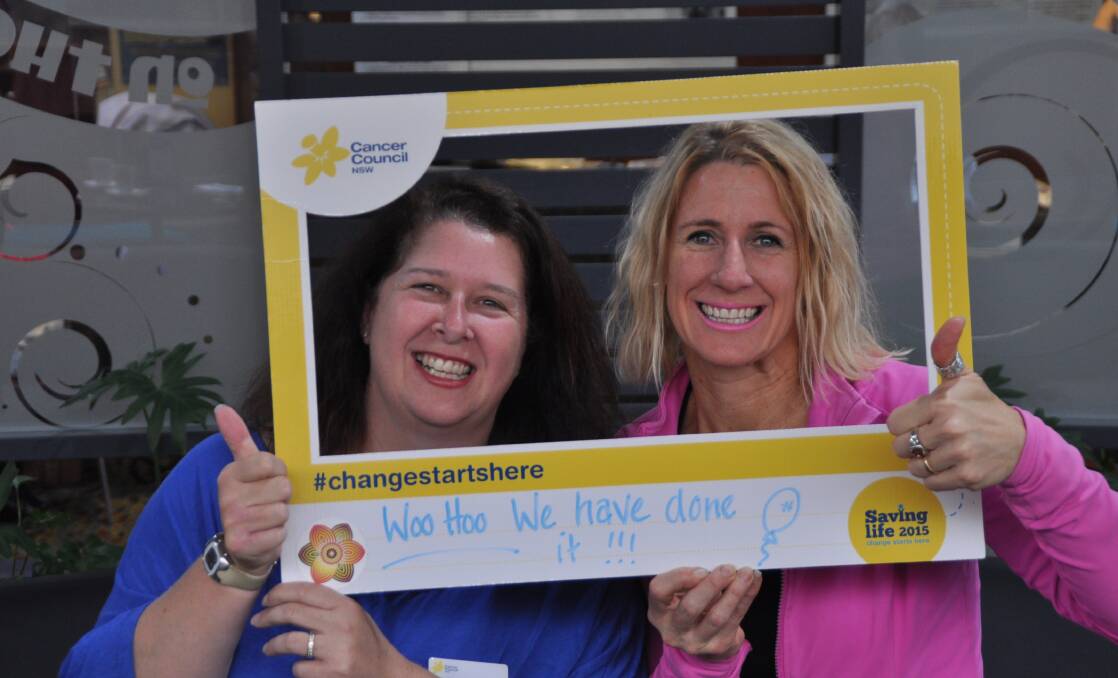 We helped Jennifer Mozina, of Cancer Council NSW, left and SueEllen Yates, of Merimbula celebrate the removal of the chemotherapy co-payment. Picture supplied
