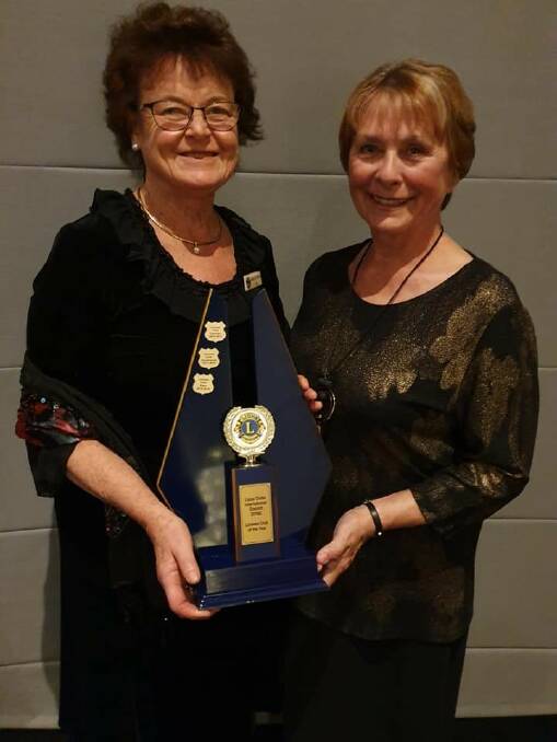 Winning team: Sandra Symonds and Jan Pyke travelled to Batemans Bay to accept the award at the Lions District Changeover Dinner on July 13. 