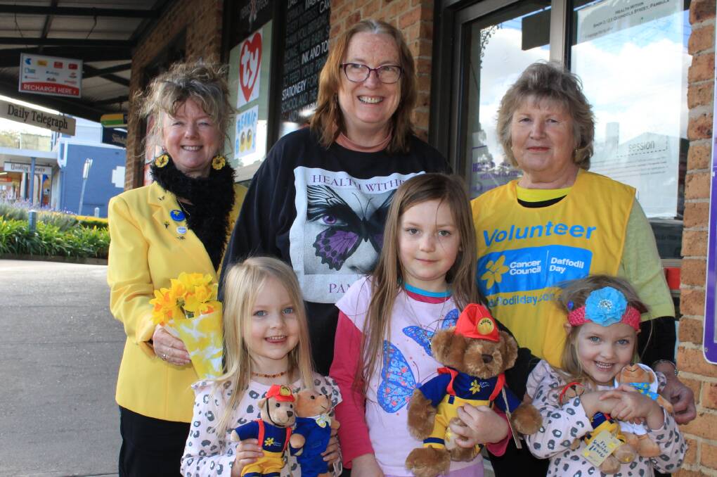 Local Daffodil Day stalls organiser Robyn Whitby with volunteer Gail Smith and Wendy Pursehouse and her three great nieces Lacey, Elsha and Evie Bowden.  