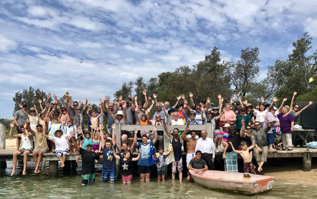 Mitchies Jetty was the scene of a baptism as people from Eden Aboriginal Evangelical Fellowship joined those from Sapphire Life Church on Sunday afternoon.