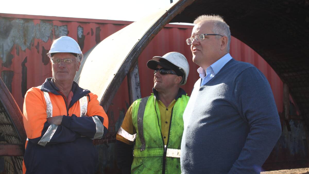 The Prime Minister at Eden chip mill last year.