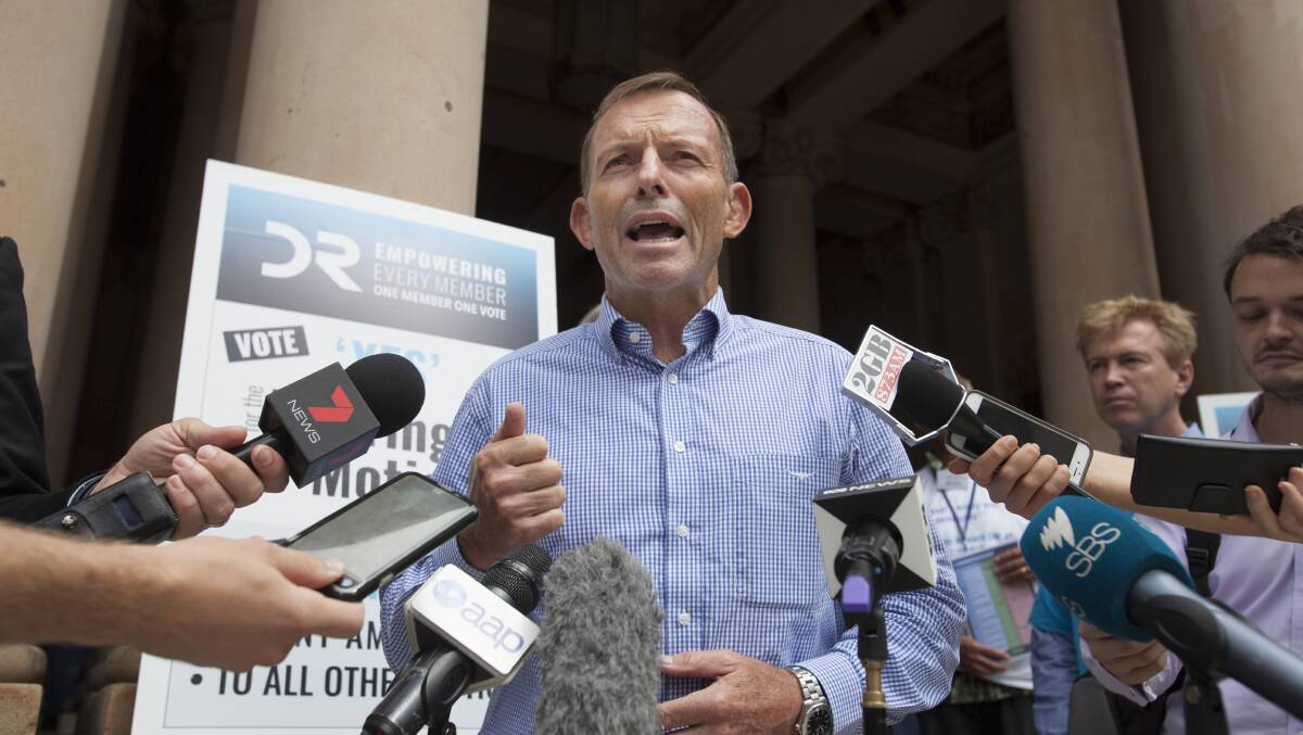 Motion defeated: Former Australian Prime Minister Tony Abbott addresses the media outside the Town Hall, Sydney on Saturday, February 10. Photo Fiona Morris