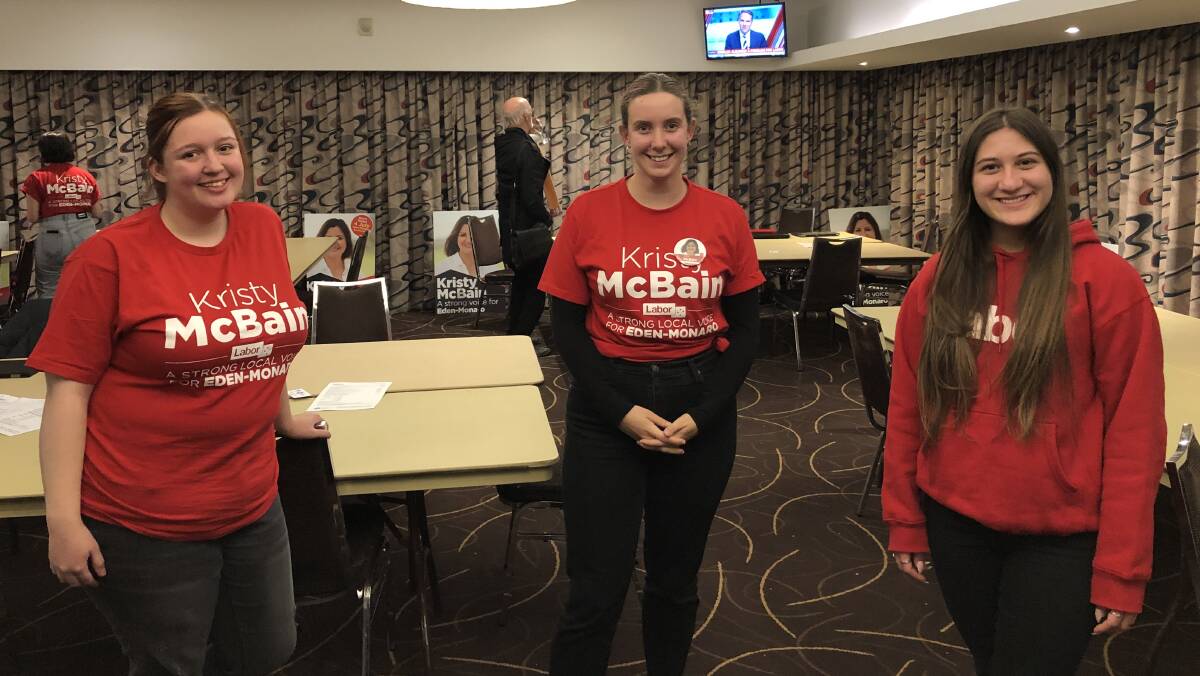 Emma Hogan, Manu Risoldi and Natalie Simonovski celebrate in a COVID safe way, after a hard-fought campaign at the Labor Party Eden-Monaro function at the Sapphire Club in Merimbula. Picture: Elliot Williams