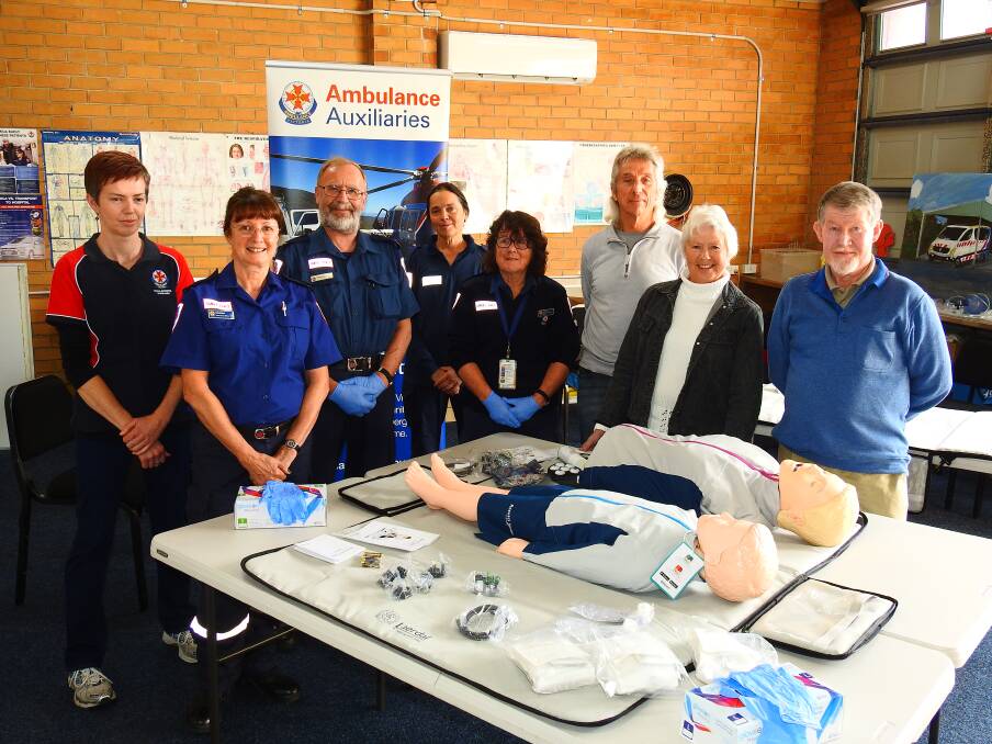 Resucitation dummies for Mallacoota Ambulance: Martin and Mariska Ascher pictured with the Mallacoota Ambulance crew. Photo: supplied. 