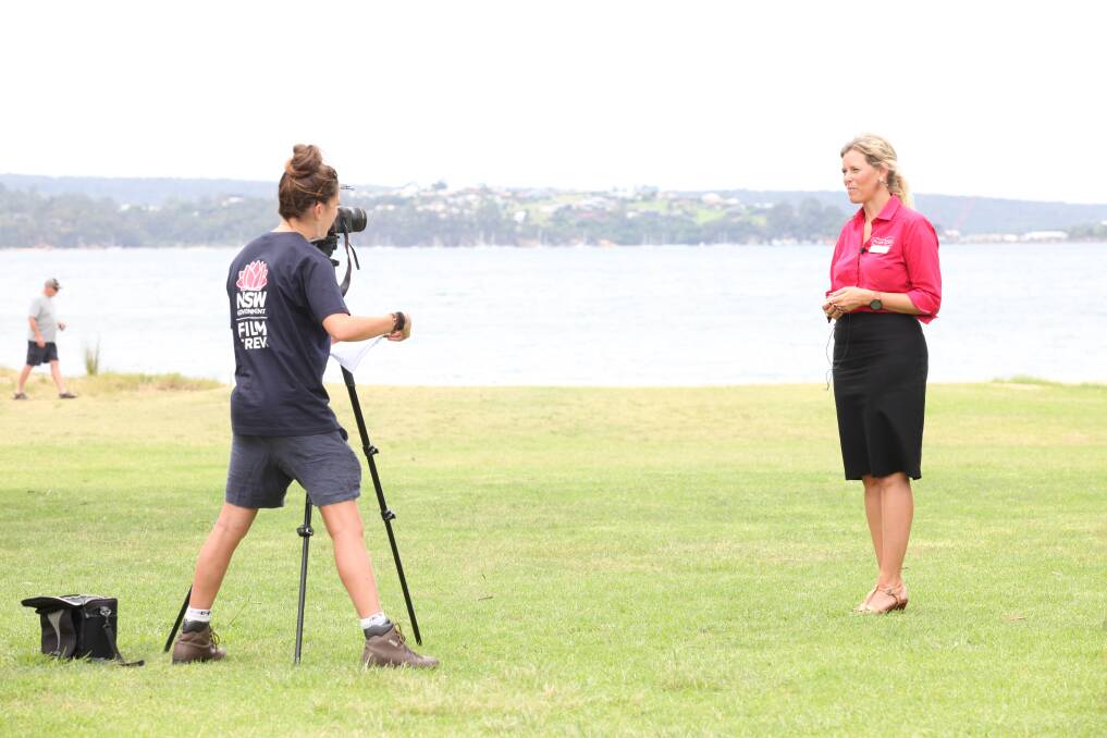 NSW Port Authority Cruise Development Manager, Natalie Godward being filmed by the NSW Government film crew at Boydtown. Picture: Rachel Mounsey