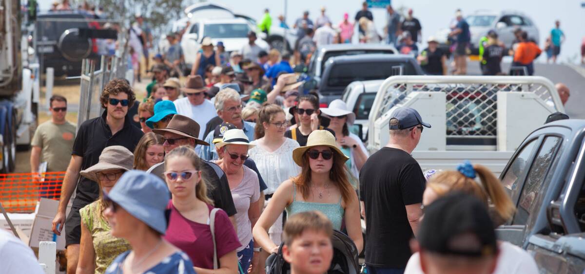 Whale festival goers pour into the Barclay Street Oval grounds. 