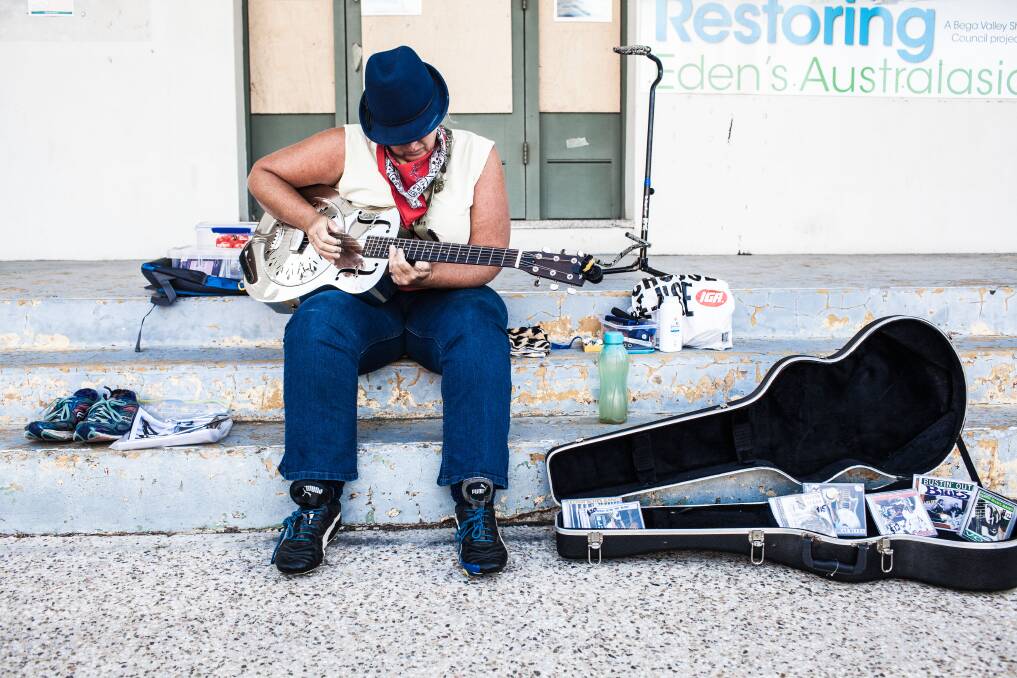 Bringing the  soul back. Mississippi Delta Blues guitarist Elixir Blues picks and slides out the tunes on the steps of the Australasia. Photo: Rachel Mounsey
