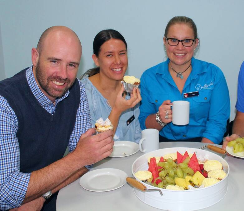 Doing it for Dolly: NSW Services Eden staff Russell Page,Marin Godfrey and Lisa Bobbin tuck into a delicious morning tea in the name of Dolly. 