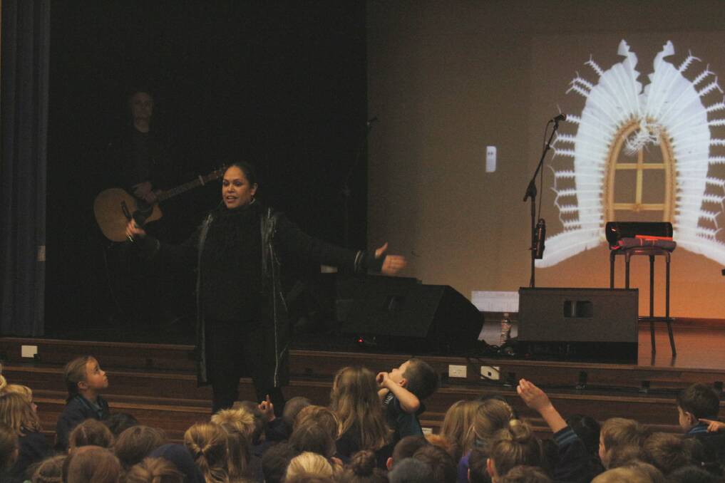 Singing in language to the Merimbula Public School students. Photo: Rachel Mounsey 