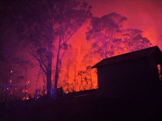  On the front line: Firefighting south of Ullladulla. Photo: Don Firth 