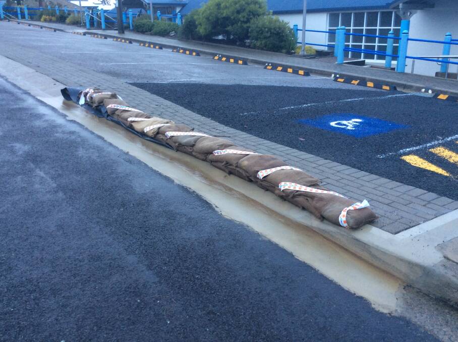  SES sandbags are in place along the gutter of the disabled car park as a precautionary measure. Photo supplied