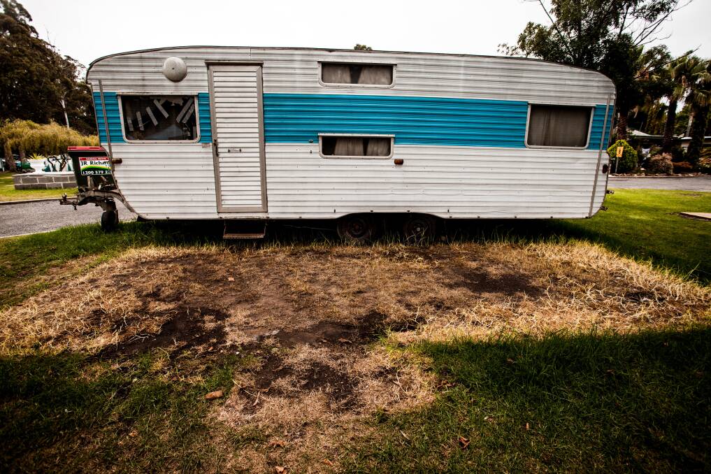 Until next year: Caravan and dead grass where the annex once was. Long time summer regulars have headed home after three weeks holiday. Photo: Rachel Mounsey