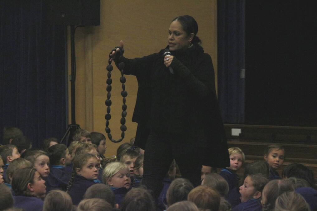 Treasure from the Torres Strait: Christine Anu explains parts of her culture to the pupils at Merimbula Public School. Photo: Rachel Mounsey