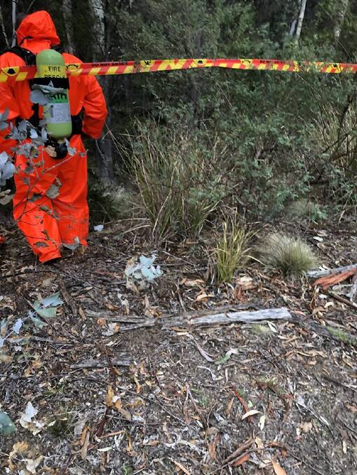 Hazmat operations underway after drums containing toxic waste were found at the base of Mount Darragh outside of Wyndham. Photo: NSW Fire and Rescue