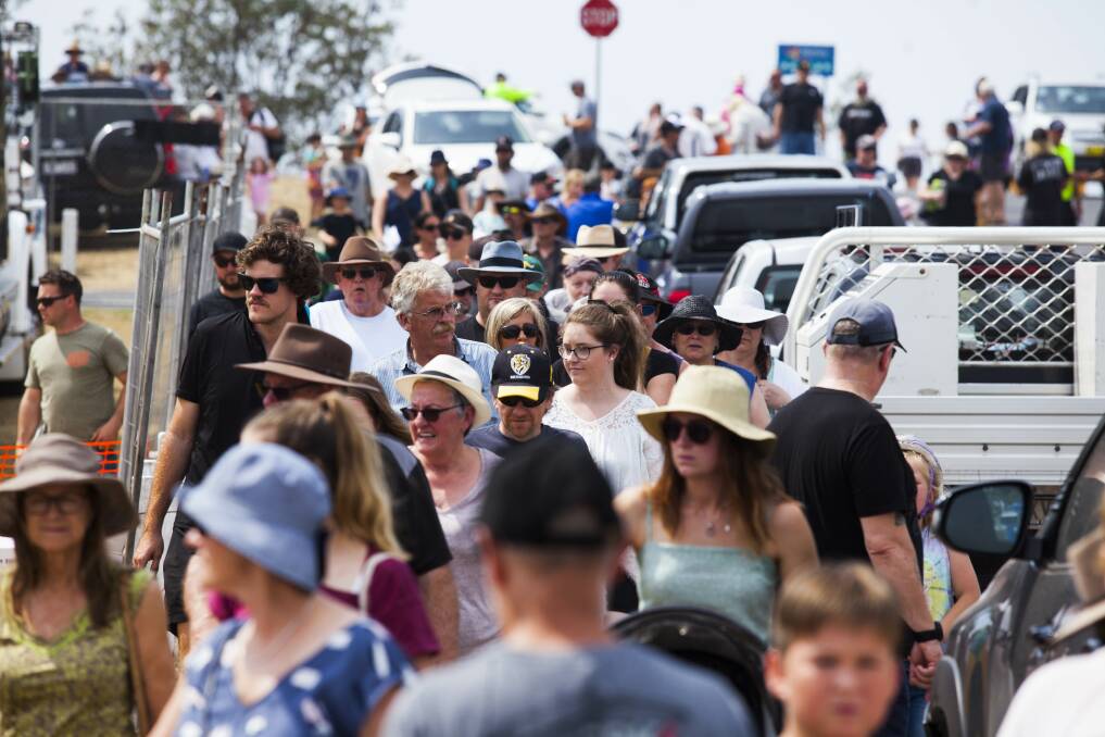 Crowds pouring into the festival grounds after the Street Parade at this year's festival. 