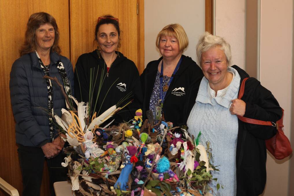 (L-R) Marion Bruce, Sharyn Bruce, Leonie Smith and Rosemary Hannah with the collaborative artwork 'Nest' at Mallacoota District Health and Support Service. 