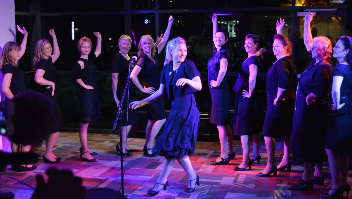 MUSICAL SPECTACULAR: A group of the Ladies in Black cast attend the launch of the production in Bega last month. 