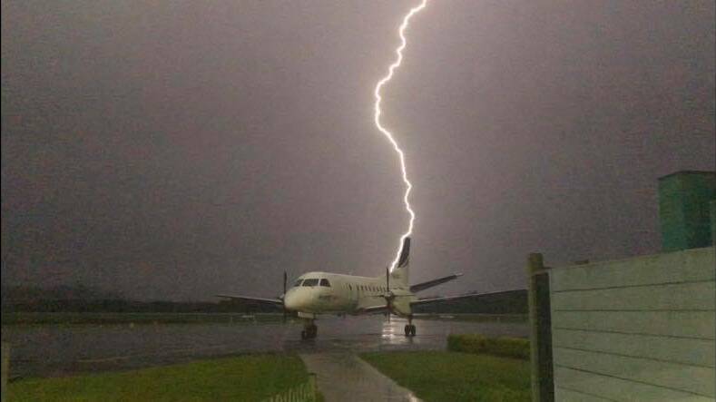 Lightning cracks in the skies above the Merimbula Airport with heavy rain and possible thunderstorms predicted for the Far South Coast through Tuesday. Photo: Kaylee Schafer