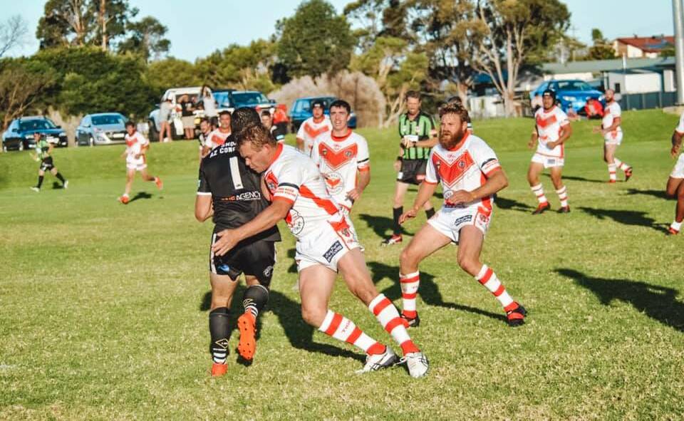 Wrapped up: Leigh Hennesy wraps up the Cooma Fullback during the Tigers' win over the Stallions at George Brown Memorial Oval on Sunday. Picture: Facebook. 