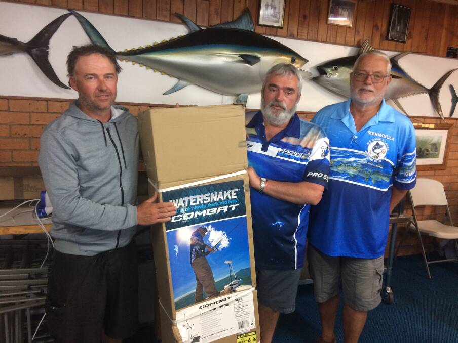 Challenge winner: Ian Neilson of Merimbula receives the major prize for his catch and release bream from Ron Vanderdrift and Peter Haar.
