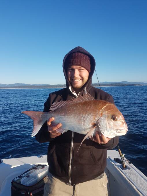Michael Martin of Merimbula shows his prize winning 3.3kg snapper taken off Haycock last Saturday during the Snapper Classic. 