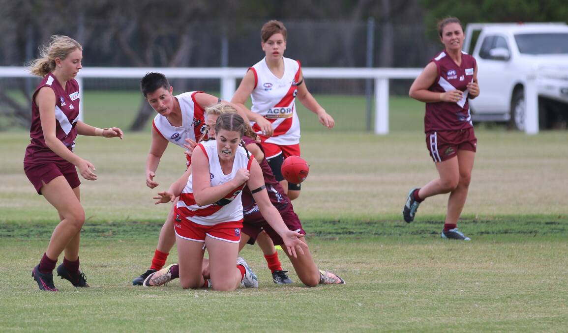 Forward leader: Alley Crowe clears the ball out of a contest with the Tathra Eaglettes, who the Whalers will face in a grand final rematch this Saturday. 