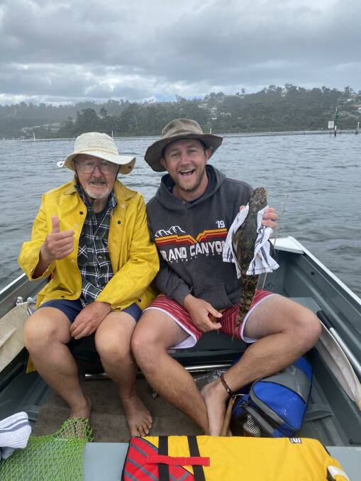 Father and son Ron and Nic Novotny of Tura Beach enjoy a days angling at Merimbula Lake showing Dusky Flathead are on the chew following the rains. 