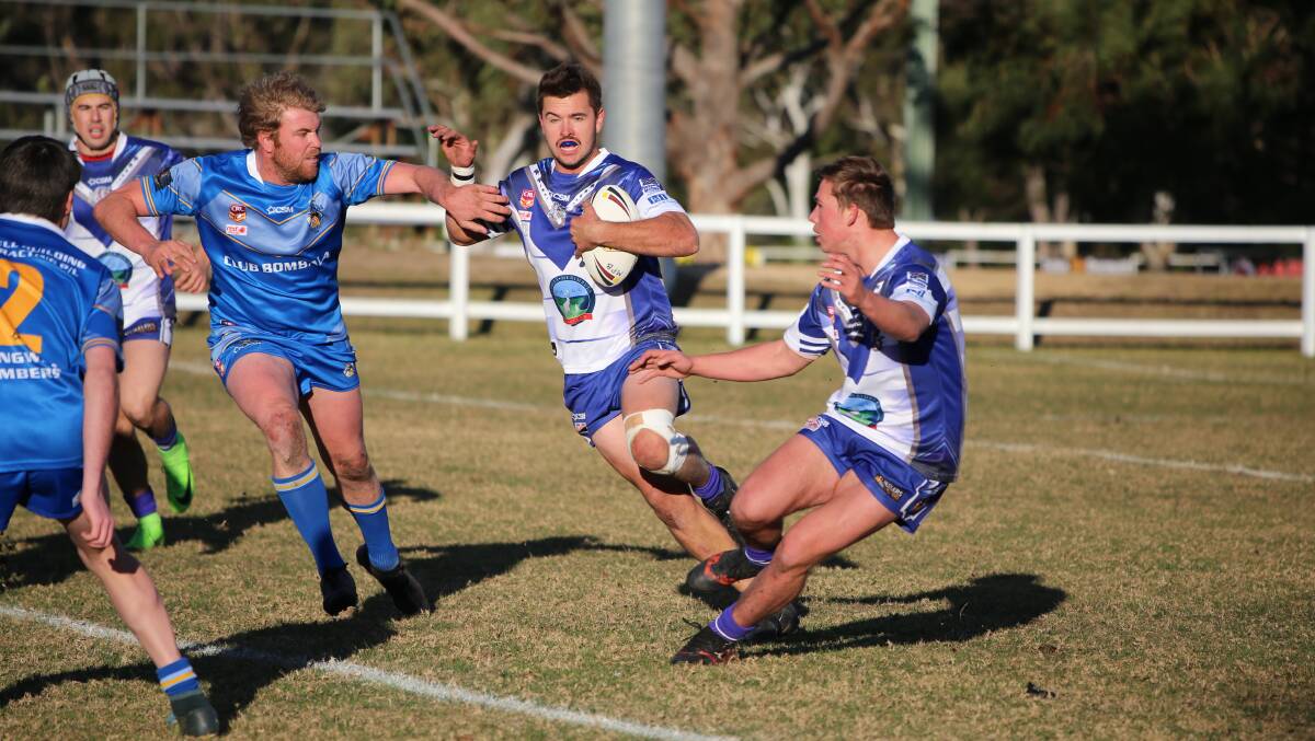 On the charge: Dylan Fletcher on a run down the left edge for the Bulldogs against the Bombala Blue Heelers with the Bulldogs getting up 26-18.