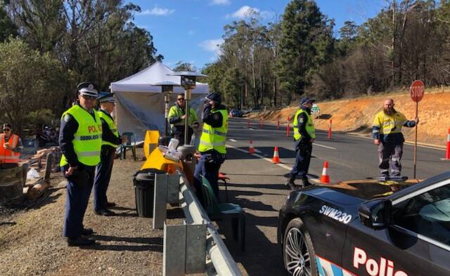 NSW Police personnel man the Victorian border crossing during earlier lockdowns with Bega Valley Shire Council clarifying border-bubble travel. 