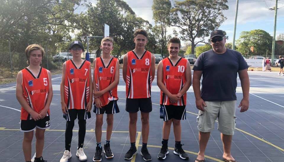 Danny Hayes and the Division three Pallet Collars Orange boys who celebrated a win on Saturday during the Indigenous Round at the Merimbula basketball courts. 