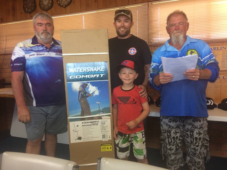 Big fish: Ron Vanderdrift and Lindon Thompson congratulate Matt Collins and his son Harry on their major prize win for the longest bream.
