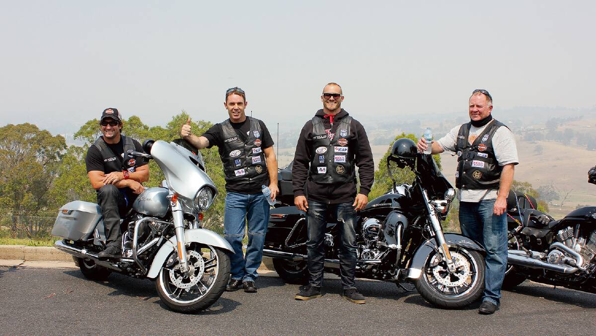 Nathan Hindmarsh, Brad Fittler, Matt Cooper and Ian Schubert make a pitstop in Bega during a previous Hogs ride, with Hindmarsh and Fittler holding a junior clinic in Jindabyne. 