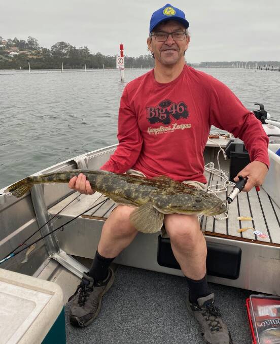 Impressive: Stuart Green of South Pambula with his 92.7cm dusky flathead caught and released in Merimbula Lake.