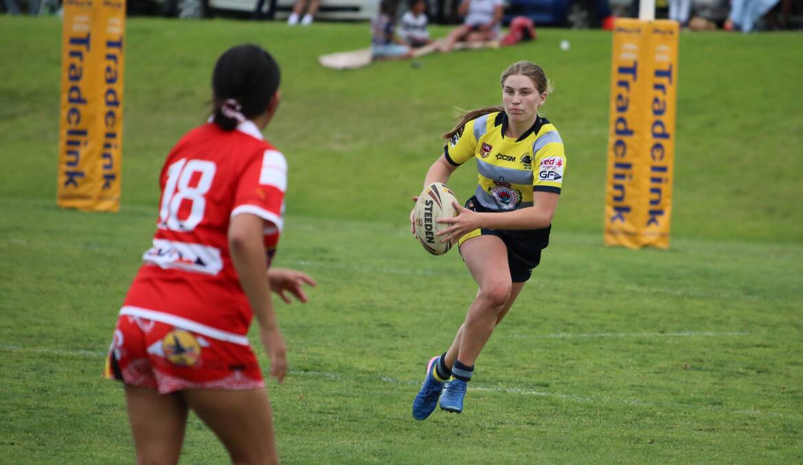 Tigerette Tamika Millard looks for a gap in the Narooma line during one of her many bursts for the Candelo-Bemboka Panthers last weekend. 