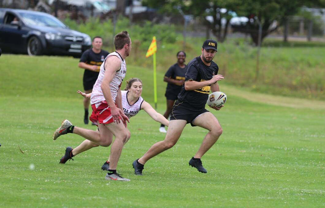 Two squads of Navy personnel also joined in for the Eden Tigers touch football knockout on Saturday. 
