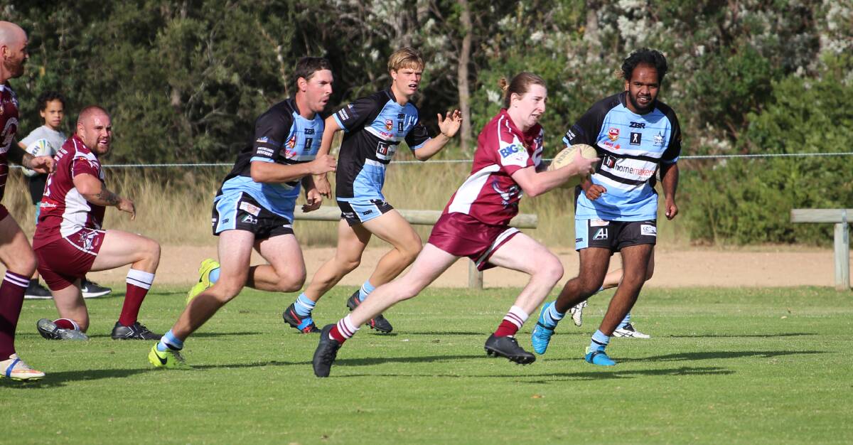 Quick scoot: Tathra's Dylan Child makes a burst past the Moruya defence to score his maiden senior try on Saturday. 