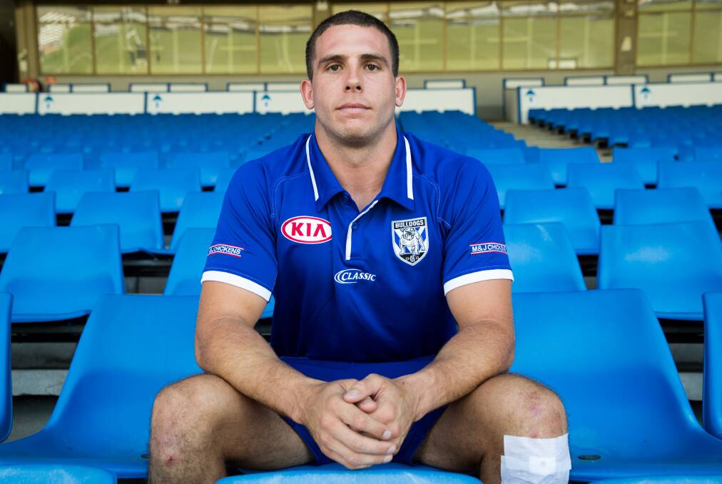 Keen for visit: Adam Elliott sits down for a portrait shoot at GIO Stadium last week ahead of appearances for the Indigenous All Stars and a trial game in Bega. 