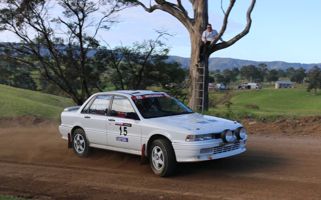 David and Alexander Eadie pass spectators on Upper Cobargo Road in their Mitsubishi Gallant in last year's Valley Rally. 