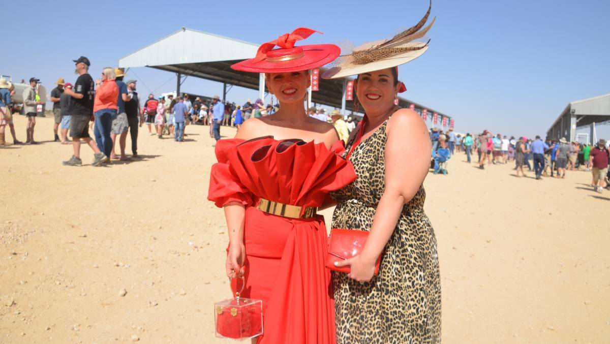 OUTBACK GLAMOUR: Mount Isa's Cheryn Ramsay and Jen Verana cut a dash at the 2019 Birdsville Cup races. 