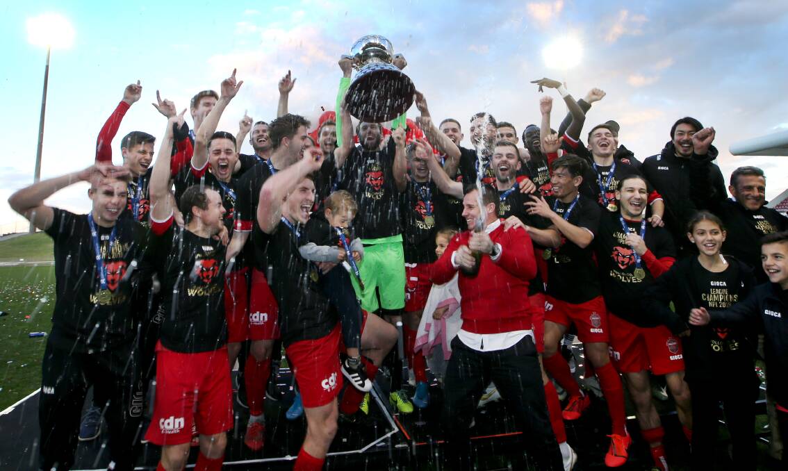 Celebration: The Wolves won last year's NSW NPL title. Picture: Sylvia Liber