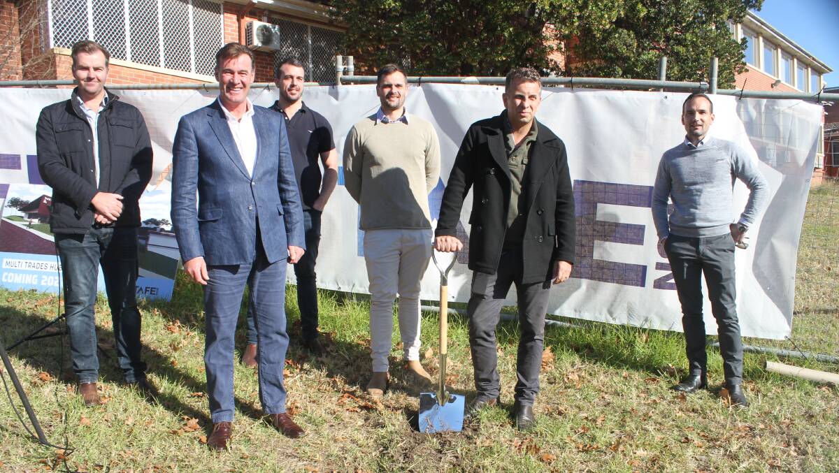 GOING AHEAD: St Hilliers Construction's Tim Casey, Mark Perkins, Greg Malenstein, Brant Wood and Scott Gorman with Bega MP Andrew Constance on Friday. Picture: Alasdair McDonald