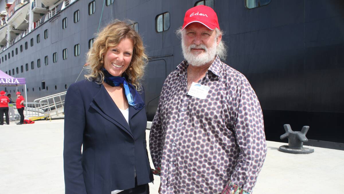 Port Authority of NSW's Natalie Godward and Eden Chamber of Commerce president Peter Whiter in front of the Pacific Aria on Friday. Picture: Alasdair McDonald