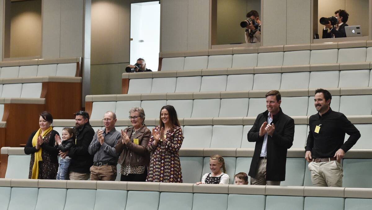 Friends and family congratulate Eden-Monaro MP Kristy McBain following her maiden speech on Monday. Photo: David Foote