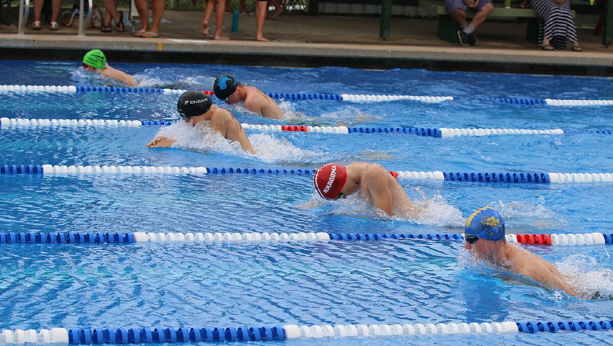Swimmers compete at the Eden Olympic Pool during the Eden Swimming Club's annual swimming carnival in February, 2017.