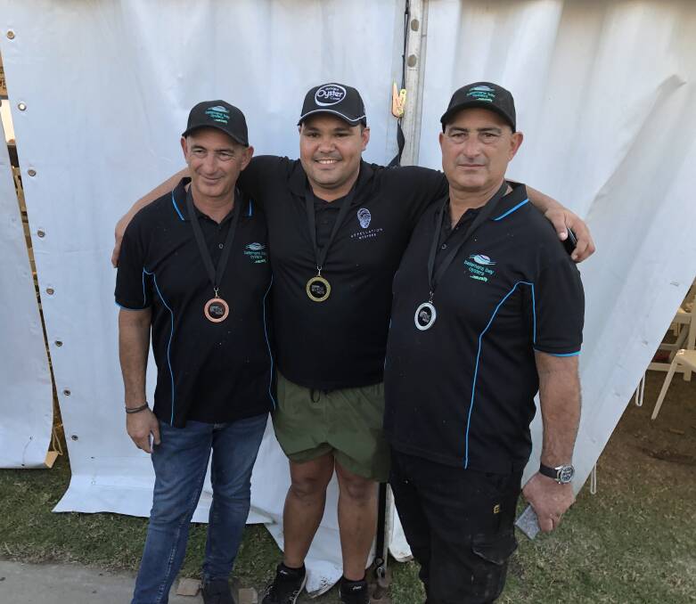 Gerard 'Doody' Dennis from Australia's Oyster Coast claimed victory in the shucking competition followed by brothers Jim and John Yiannaros from Batemans Bay Oysters.