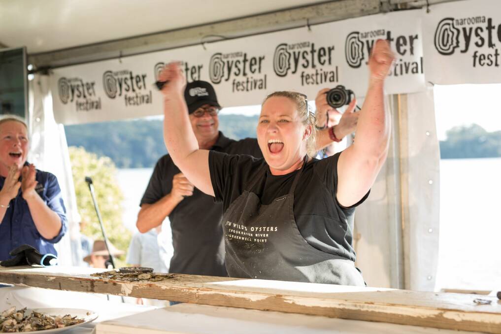 Sally McLean of Jim Wild's Oysters out shucked reigning champion Sue McIntyre by 0.3 seconds in the popular oyster shucking competition. Photo: Narooma Oyster Festival