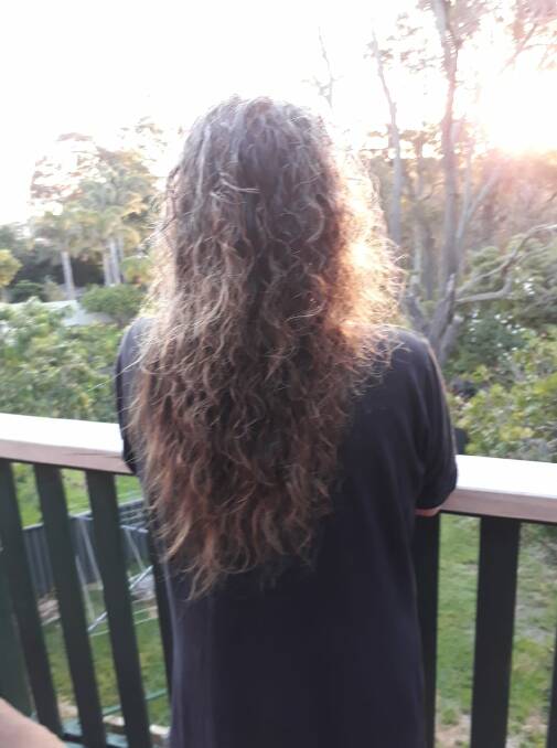 Kristy-Lee Crowley said her long, curly hair will be donated to make a wig for someone special. Photo supplied.